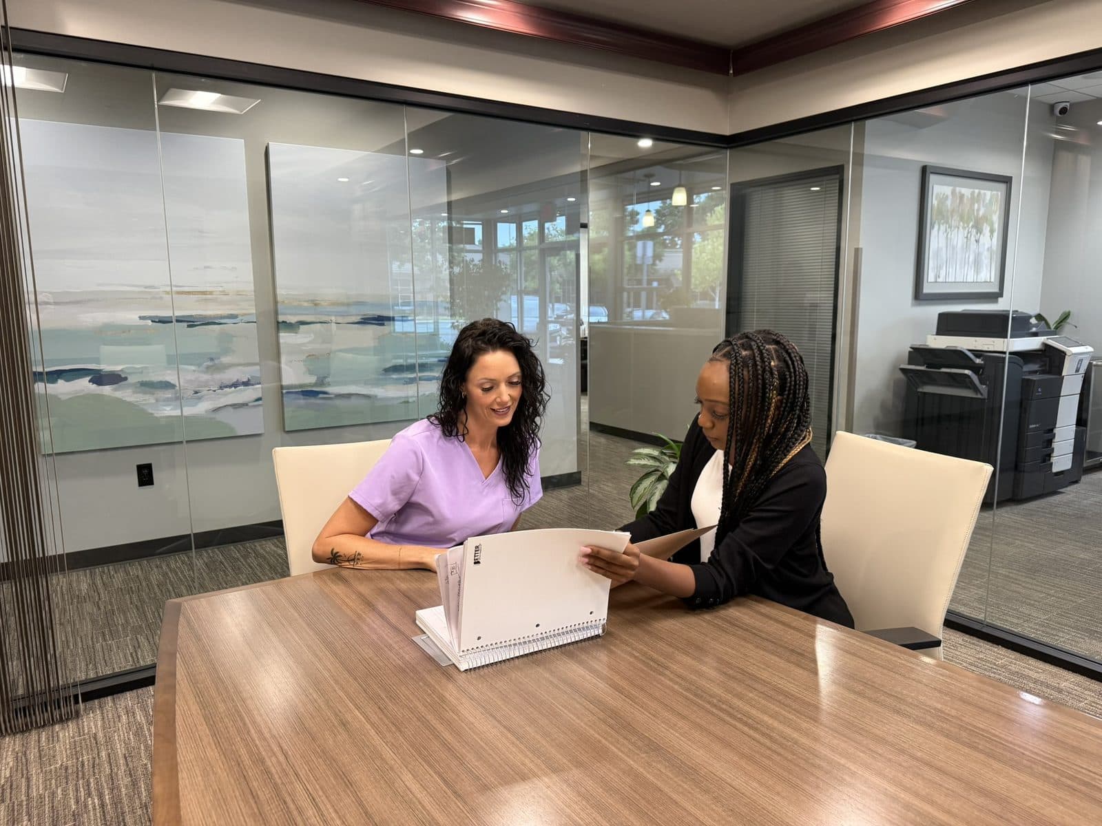 Reviewing a care plan proposal at the Home Care by Athena office