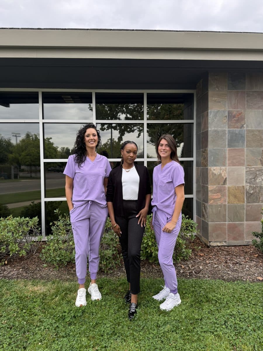 Athena caregivers and the care coordinator outside the office