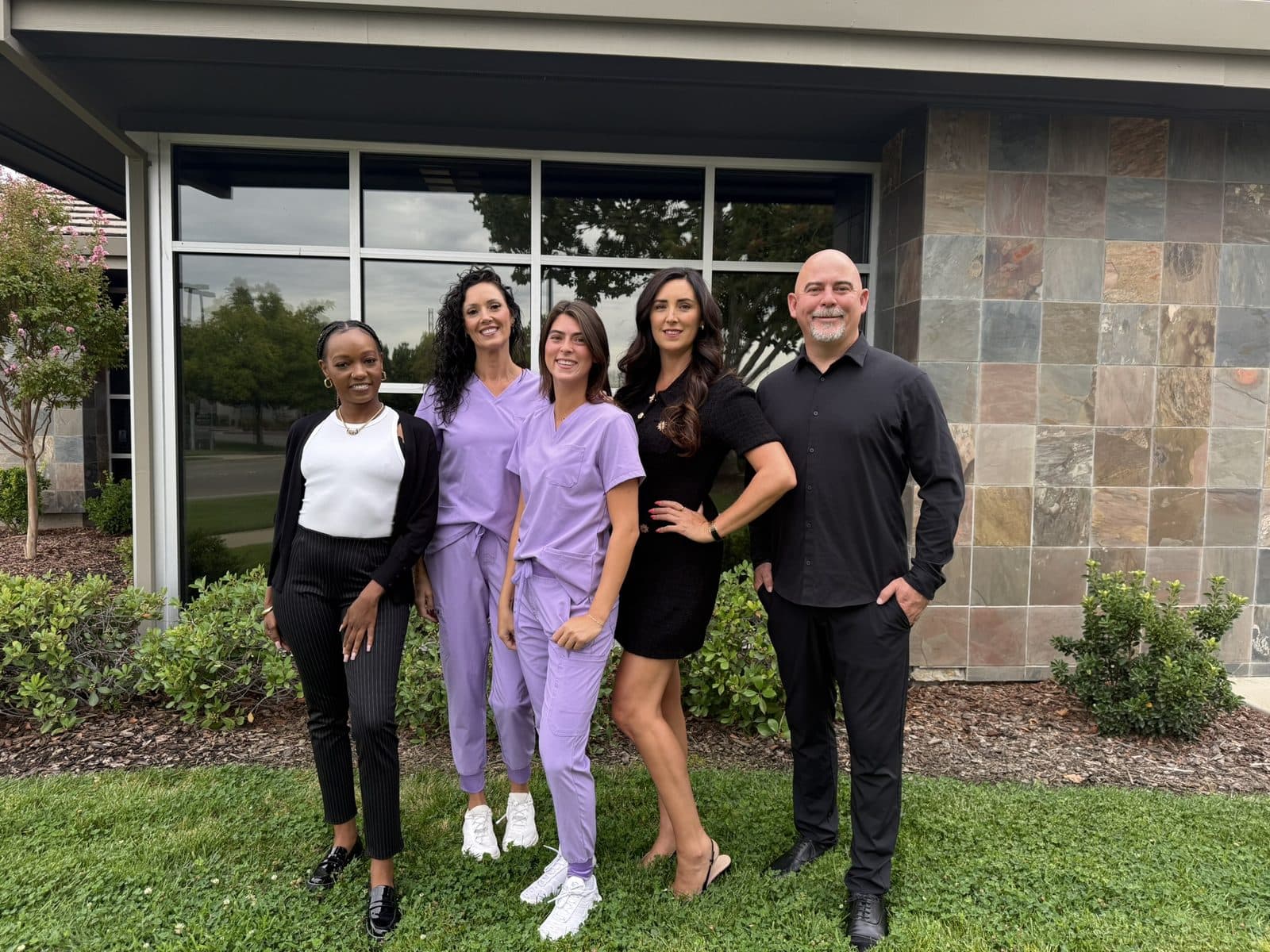 The Home Care by Athena team of five outside the office in Roseville, CA